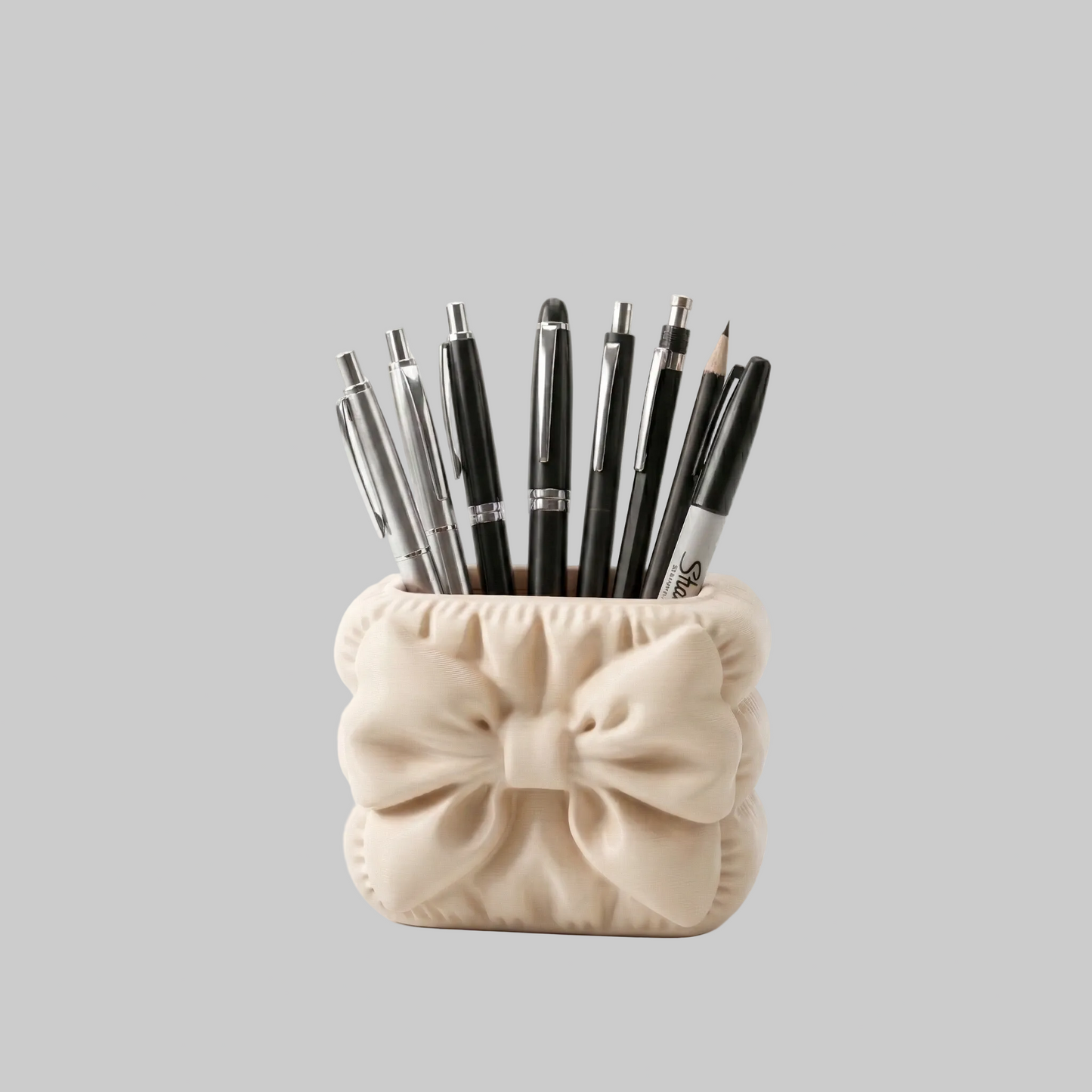 Porta-canetas bege com design de laço estilo puff organizador de mesa moderno